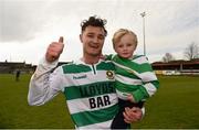 10 April 2016; Sheriff YC captain Paul Murphy celebrates with his three year old son Jade Murphy after the game. FAI Junior Cup Semi-Final, Sheriff YC v Janesboro FC.  Tolka Rovers Complex, Griffith Avenue, Dublin. Photo by Sportsfile