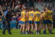 10 April 2016; Roscommon joint manager Fergal O'Donnell makes his way towards the team huddle before the game. Allianz Football League, Division 1, Semi-Final, Kerry v Roscommon, Croke Park, Dublin. Picture credit: Dáire Brennan / SPORTSFILE