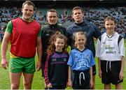10 April 2016; Dublin captain Stephen Cluxton, Donegal captain Michael Murphy and referee Maurice Deegan with Allianz mascots Caoimhe Mythen, left, Donabate / Portrane, Educate Together, and Rachel Fearon, Scoil Mhuire, Howth, and junior whistler Andrew Keegan, Holy Trinity NS, Donaghmede, at the Dublin v Donegal game. Allianz Football League, Division 1, Semi-Final, Dublin v Donegal, Croke Park, Dublin. Picture credit: Brendan Moran / SPORTSFILE