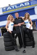 19 April 2010; Irish Open Champion Shane Lowry pictured with models Jenny Lee Masterson, left, and Nadia Forde at Atlas Tyres newly opened depot in Baldoyle, Dublin, at the announcement of his new sponsorship deal with the company. Atlas Tyres customers can have an opportunity to play golf with Shane Lowry. Further details are available at www.atlastyres.ie or by visiting one of Atlas Tyres Dublin depots. Atlas Tyres and Auto Services Depot, Baldoyle, Dublin. Picture credit: David Maher / SPORTSFILE