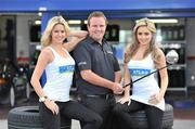 19 April 2010; Irish Open Champion Shane Lowry pictured with models Jenny Lee Masterson, left, and Nadia Forde at Atlas Tyres newly opened depot in Baldoyle, Dublin, at the announcement of his new sponsorship deal with the company. Atlas Tyres customers can have an opportunity to play golf with Shane Lowry. Further details are available at www.atlastyres.ie or by visiting one of Atlas Tyres Dublin depots. Atlas Tyres and Auto Services Depot, Baldoyle, Dublin. Picture credit: David Maher / SPORTSFILE