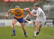 18 April 2010; John Conlon, Clare, in action against Neil O' Muineachain, Kildare. Allianz GAA Hurling National League, Division 2, Round 7, Kildare v Clare, St Conleth's Park, Newbridge, Co. Kildare. Picture credit: Barry Cregg / SPORTSFILE