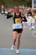 18 April 2010; Martin Fagan, Mullingar Harriers AC, crosses the finish line to win the Woodie's DIY AAI 10k Championships/Great Ireland Run. Phoenix Park, Dublin. Picture credit: Pat Murphy / SPORTSFILE