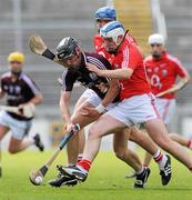 18 April 2010; Eoin Lynch, Galway, in action against Graham Calnan and Kieran Murphy, Cork. Allianz GAA Hurling National League, Division 1, Round 7, Galway v Cork, Pearse Stadium, Galway. Picture credit: Ray Ryan / SPORTSFILE