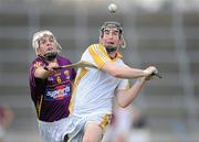18 April 2010; Eddie McCloskey, Antrim, in action against Ciaran Kenny, Wexford. Allianz GAA Hurling National League, Division 2, Round 7, Wexford v Antrim, Wexford Park, Wexford. Picture credit: Matt Browne / SPORTSFILE