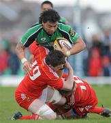 18 April 2010; Troy Nathan, Connacht, is tackled by Peter O' Mahoney and Dave Foley, Munster. Celtic League, Connacht v Munster, Sportsground, Galway. Picture credit: Ray Ryan / SPORTSFILE