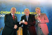 17 April 2010; Uachtarán Chumann Lúthchleas Gael Criostóir Ó Cuana and Ard Stiúrthóir Páraic Duffy make a presentation to Gerald McKenna, Kerry, who has retired from Ard Comhairle. Speaking at the presentation the GAA President said that Gerald's contributions both from the floor at Congress and indeed at Ard Comhairle are nothing less than legendary and his analytical mind is only matches by his renowned oratorical skills. His span as a member of Ard Comhairle began in 1976 when he replaced Dr Jim Brosnan and has served under no less than 11 Presidents. GAA Annual Congress, Slieve Donard Hotel, Newcastle, Co. Down. Picture credit: Ray McManus / SPORTSFILE  *** Local Caption ***