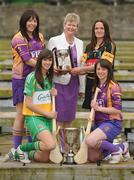 19 April 2010; At a captain's day photocall ahead of the 2010 National Camogie League Division 1 and 2 Finals, Division 1 captains Una Leacy, back left, Wexford, and Anne Dalton, Kilkenny with Joan O'Flynn, President, Cumann Camogaiochta na nGael and Division 2 captains Michaela Morkan, front left, Offaly, and Ciara O'Connor, Wexford. Both finals take place in Semple Stadium, Thurles, on Saturday next, 24th April, with the Division 2 Final at 2pm and the Division 1 Final at 4pm. Maldron Hotel, Grand Canal, Dublin. Picture credit: Brendan Moran / SPORTSFILE