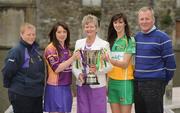 19 April 2010; At a captain's day photocall ahead of the 2010 National Camogie League Division 1 and 2 Finals, are Division 2 finalists Wexford and Offaly, from left, Karen Barnes, manager and captain Ciara O'Connor, Wexford, Joan O'Flynn, President, Cumann Camogaiochta na nGael, Michaela Morkan, captain and Joachim Kelly, manager, Offaly. Both finals take place in Semple Stadium, Thurles, on Saturday next, 24th April, with the Division 2 Final at 2pm and the Division 1 Final at 4pm. Maldron Hotel, Grand Canal, Dublin. Picture credit: Brendan Moran / SPORTSFILE