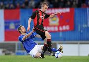 19 April 2010; Paddy Madden, Bohemians, shoots to score his side's first goal despite the efforts of Steven Douglas, Linfield. Setanta Sports Cup Semi-Final 2nd Leg, Linfield v Bohemians, Windsor Park, Belfast. Photo by Sportsfile