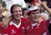 17 September 1989; Cork players, Larry Tompkins, left, and John O'Driscoll, celebrate on the steps of the Hogan Stand after the game. Cork v Mayo, All-Ireland Football Final, Croke Park, Dublin. Picture credit; Ray McManus / SPORTSFILE