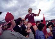 17 August 1986; Plunkett Donaghy of Tyrone celebrates with supporters after their side's victory in the All-Ireland Football Championship Semi-Final match between Tyrone and Galway at Croke Park, Dublin. Photo by Ray McManus/Sportsfile