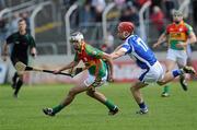 18 April 2010; Craig Doyle, Carlow, in action against John Delaney, Laois. Allianz GAA Hurling National League, Division 2, Round 7, Carlow v Laois, Dr Cullen Park, Carlow. Picture credit: Brian Lawless / SPORTSFILE