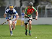 18 April 2010; Des Shaw, Carlow, in action against Zane Keenan, Laois. Allianz GAA Hurling National League, Division 2, Round 7, Carlow v Laois, Dr Cullen Park, Carlow. Picture credit: Brian Lawless / SPORTSFILE