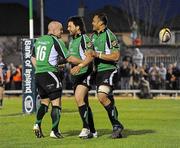 21 April 2010; Troy Nathan, centre, Connacht, is congratulated after scoring a try against Leinster by team-mates Drian Flavin and George Naoupu. Celtic League, Connacht v Leinster, Sportsground, Galway. Picture credit: Ray Ryan / SPORTSFILE
