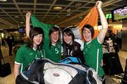 22 April 2010; The Republic of Ireland team arrived home after qualifying for the European Women's U17 Championships Semi-Finals. The team were due to arrive home on Saturday 18th April but were delayed in Istanbul due to the disruption to air travel. Players, from left, Jessica Gleeson, Ciara O'Brien, both from Tramore, Co. Waterford, Amanda Budden, from Wilton, Cork, and Megan Campbell, from Baldonnell, Dublin, celebrate on arrival. Dublin Airport, Dublin. Picture credit: Brian Lawless / SPORTSFILE