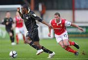 23 April 2010; Joseph Ndo, Sligo Rovers, in action against Dave Mulcahy, St Patrick's Athletic. Airtricity League Premier Division, St Patrick's Athletic v Sligo Rovers, Richmond Park, Inchicore, Dublin. Picture credit: David Maher / SPORTSFILE