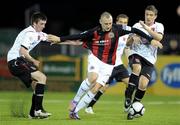 23 April 2010; Mark Quigley, Bohemians, in action against Johnny Breen, left, and Shaun Kelly, Dundalk. Airtricity League Premier Division, Dundalk v Bohemians, Oriel Park, Dundalk, Co. Louth. Photo by Sportsfile