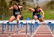 15 April 2016; Catherine McManus, DCU, right, races Lilly-Ann O'Hara, DCU, on her way to winning the 100m hurdles semi final event. Irish Universities Athletic Association Track & Field Championships 2016, Day 1. Morton Stadium, Santry, Co. Dublin. Picture credit: Cody Glenn / SPORTSFILE