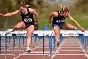 15 April 2016; Catherine McManus, DCU, left, on her way to a first place finish ahead of Lilly-Ann O'Hora, DCU, second place in the women's 100m hurdles event. Irish University Athletic Association Track & Field Championships 2016, Day 1. Morton Stadium, Santry, Co. Dublin. Picture credit: Cody Glenn / SPORTSFILE