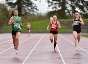 15 April 2016; Leah Bergin, IT Blanchardstown, on her way to a first-place finish in the women's 200m semi-final event ahead of Sophia Ellis, DCU, right, who finished second and Christine Neville, UCC, who finished third. Irish Universities Athletic Association Track & Field Championships 2016, Day 1. Morton Stadium, Santry, Co. Dublin. Picture credit: Cody Glenn / SPORTSFILE