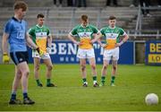16 April 2016; Offaly players, from left, Dylan Kavanagh, Jack Quinn, and Stefan Geoghegan look on as Seán Bulger, Dublin, lines up his penalty kick, which he scored for his side's second goal. Electric Ireland Leinster GAA Football Minor Championship First Round, Dublin v Offaly. Parnell Park, Dublin.  Picture credit: Cody Glenn / SPORTSFILE