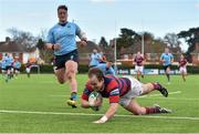 16 April 2016; Evan Ryan, Clontarf, scores his side's first try despite the efforts of Andrew Porter, UCD. Ulster Bank League Division 1A Final Round, Clontarf v UCD. Castle Avenue, Clontarf, Dublin. Picture credit: Cody Glenn / SPORTSFILE