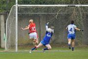 24 April 2010; Nollaig Cleary, Cork, has her shot saved by Monaghan goalkeeper Edel Corrigan. Bord Gais Energy Ladies National Football League Division 1 Semi-Final, Cork v Monaghan, St Rynaghs GAA, Banagher, Co Offaly. Picture credit: David Maher / SPORTSFILE
