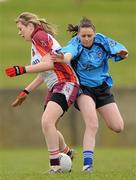 24 April 2010; Shannen O'Grady, St Paul's, in action against Carrie Browne, Eureka SS. Tesco All-Ireland Junior B Post Primary Schools Final, Eureka SS, Kells v St Paul’s, Bessbook, Armagh, Gaelic Grounds, Drogheda, Co. Louth. Photo by Sportsfile