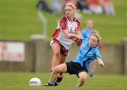24 April 2010; Therese Murphy, St Paul's, in action against Sinead Reilly, Eureka SS. Tesco All-Ireland Junior B Post Primary Schools Final, Eureka SS, Kells v St Paul’s, Bessbook, Armagh, Gaelic Grounds, Drogheda, Co. Louth. Photo by Sportsfile