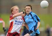 24 April 2010; Louise Kenny, St Paul's, in action against Jacqueline Kavanagh, Eureka SS. Tesco All-Ireland Junior B Post Primary Schools Final, Eureka SS, Kells v St Paul’s, Bessbook, Armagh, Gaelic Grounds, Drogheda, Co. Louth. Photo by Sportsfile