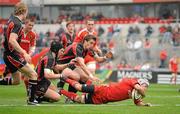 24 April 2010; Duncan Williams, Munster, scores his side's second try despite the efforts of John Shiels, left, and Dave McIlwhaine, Ulster Ravens. British and Irish Cup Semi-Final, Munster v Ulster Ravens, Thomond Park, Limerick. Picture credit: Diarmuid Greene / SPORTSFILE