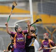 24 April 2010; Una Leacy, Wexford, in action against Amy Butler, Kilkenny. Division 1 Camogie National League Final, Offaly v Wexford, Semple Stadium, Thurles, Co. Tipperary. Picture credit: Brian Lawless / SPORTSFILE