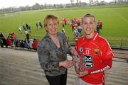 24 April 2010; Geraldine Giles from the Ladies Football Assocation presents the Bord Gais Energy player of the match award to Mary O'Connor, Cork. Bord Gais Energy Ladies National Football League Division 1 Semi-Final, Cork v Monaghan, St Rynaghs GAA, Banagher, Co Offaly. Picture credit: David Maher / SPORTSFILE