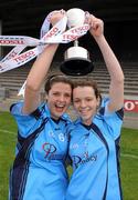 24 April 2010; Eureka SS joint captains Grainne Mackin, left, and Megan O'Brien celebrate with the cup. Tesco All-Ireland Junior B Post Primary Schools Final, Eureka SS, Kells v St Paul’s, Bessbook, Armagh, Gaelic Grounds, Drogheda, Co. Louth. Photo by Sportsfile
