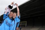 24 April 2010; Eureka SS joint captains Grainne Mackin, left, and Megan O'Brien celebrate with the cup. Tesco All-Ireland Junior B Post Primary Schools Final, Eureka SS, Kells v St Paul’s, Bessbook, Armagh, Gaelic Grounds, Drogheda, Co. Louth. Photo by Sportsfile