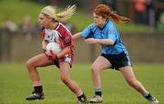 24 April 2010; Therese Murphy, St Paul's, in action against Sinead Walsh, Eureka SS. Tesco All-Ireland Junior B Post Primary Schools Final, Eureka SS, Kells v St Paul’s, Bessbook, Armagh, Gaelic Grounds, Drogheda, Co. Louth. Photo by Sportsfile