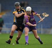 24 April 2010; Mary Leacy, Wexford, in action against Edwina Keane, Kilkenny. Division 1 Camogie National League Final, Offaly v Wexford, Semple Stadium, Thurles, Co. Tipperary. Picture credit: Brian Lawless / SPORTSFILE