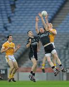 24 April 2010; Stephen Gilmartin, left, and Tony Taylor, Sligo, in action against Brendan Herron, left, and Michael McCann, Antrim. Allianz GAA Football National League Division 3 Final, Antrim v Sligo, Croke Park, Dublin. Picture credit: Stephen McCarthy / SPORTSFILE