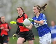 24 April 2010; Meabh MacManamon, Colaiste Choilim, in action against Cliona Murray, Scoil Mhuire. Tesco All-Ireland Junior C Post Primary Schools Final, Colaiste Choilim, Ballincollig, Cork v Scoil Mhuire, Trim, Meath, St Rynaghs GAA, Banagher, Co Offaly. Picture credit: David Maher / SPORTSFILE