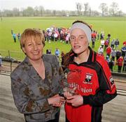 24 April 2010; Geraldine Giles from the Ladies Football Assocation presents the player of the match award to Laura Dempsey, Scoil Mhuire. Tesco All-Ireland Junior C Post Primary Schools Final, Colaiste Choilim, Ballincollig, Cork v Scoil Mhuire, Trim, Meath, St Rynaghs GAA, Banagher, Co Offaly. Picture credit: David Maher / SPORTSFILE