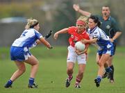 24 April 2010; Amy O'Shea, Cork, in action against Michelle Grimes, left, and Rachel McKenna, Monaghan. Bord Gais Energy Ladies National Football League Division 1 Semi-Final, Cork v Monaghan, St Rynaghs GAA, Banagher, Co Offaly. Picture credit: David Maher / SPORTSFILE