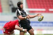 25 April 2010; Mike McComish, Connacht, is tackled by David Lyons, Scarlets. Celtic League, Scarlets v Connacht, Parc y Scarlets, Llanelli, Wales. Picture credit: Steve Pope / SPORTSFILE