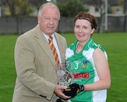25 April 2010; Pat Quill, President of the Ladies Gaelic Football Association, presents the player of the match award to Sandra Healy, Limerick. Bord Gais Energy Ladies National Football League Division 4 Semi-Final, Antrim v Limerick, Lorcan O'Toole Park, Crumlin, Dublin. Picture credit: Matt Browne / SPORTSFILE