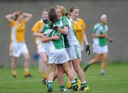 25 April 2010; Limerick's Marie Claire Curtin, Dympna O'Brien, left, and Janet Garvey, right, celebrate after the final whistle. Bord Gais Energy Ladies National Football League Division 4 Semi-Final, Antrim v Limerick, Lorcan O'Toole Park, Crumlin, Dublin. Picture credit: Matt Browne / SPORTSFILE