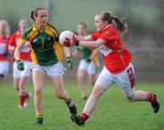 25 April 2010; Maria Reid, Louth, in action against Sinead Brennan, Leitrim. Bord Gais Energy Ladies National Football League Division 4 Semi-Final, Leitrim v Louth, Kildallan GAA, Daisy Hill, Ballyconnell, Co. Cavan. Picture credit: Oliver McVeigh / SPORTSFILE