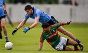 16 April 2016; Kieran Doherty, Dublin, is tackled by Shairoze Akram, Mayo. Eirgrid GAA Football Under 21 All-Ireland Championship semi-final, Dublin v Mayo. O'Connor Park, Tullamore, Co. Offaly.  Picture credit: Brendan Moran / SPORTSFILE