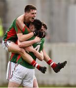 16 April 2016; Mayo's David Kenny, left, celebrates with team-mates Brian Reape, centre, and Liam Irwin at the final whistle. Eirgrid GAA Football Under 21 All-Ireland Championship semi-final, Dublin v Mayo. O'Connor Park, Tullamore, Co. Offaly.  Picture credit: Brendan Moran / SPORTSFILE