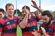16 April 2016; Clontarf team-mates, from left, Rob Keogh, Ian Hirst and Mick McGrath in the team huddle after their victory. Ulster Bank League Division 1A, Final Round, Clontarf v UCD. Castle Avenue, Clontarf, Dublin. Picture credit: Cody Glenn / SPORTSFILE