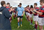 16 April 2016; UCD captain Emmet MacMahon leads his team off the pitch as they are clapped off by Clontarf. Ulster Bank League Division 1A, Final Round, Clontarf v UCD. Castle Avenue, Clontarf, Dublin. Picture credit: Cody Glenn / SPORTSFILE